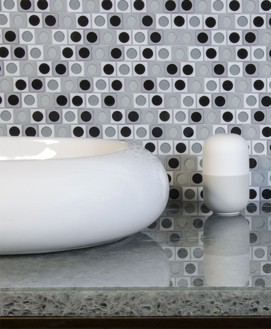 Interstyle tile wall with grey countertop.