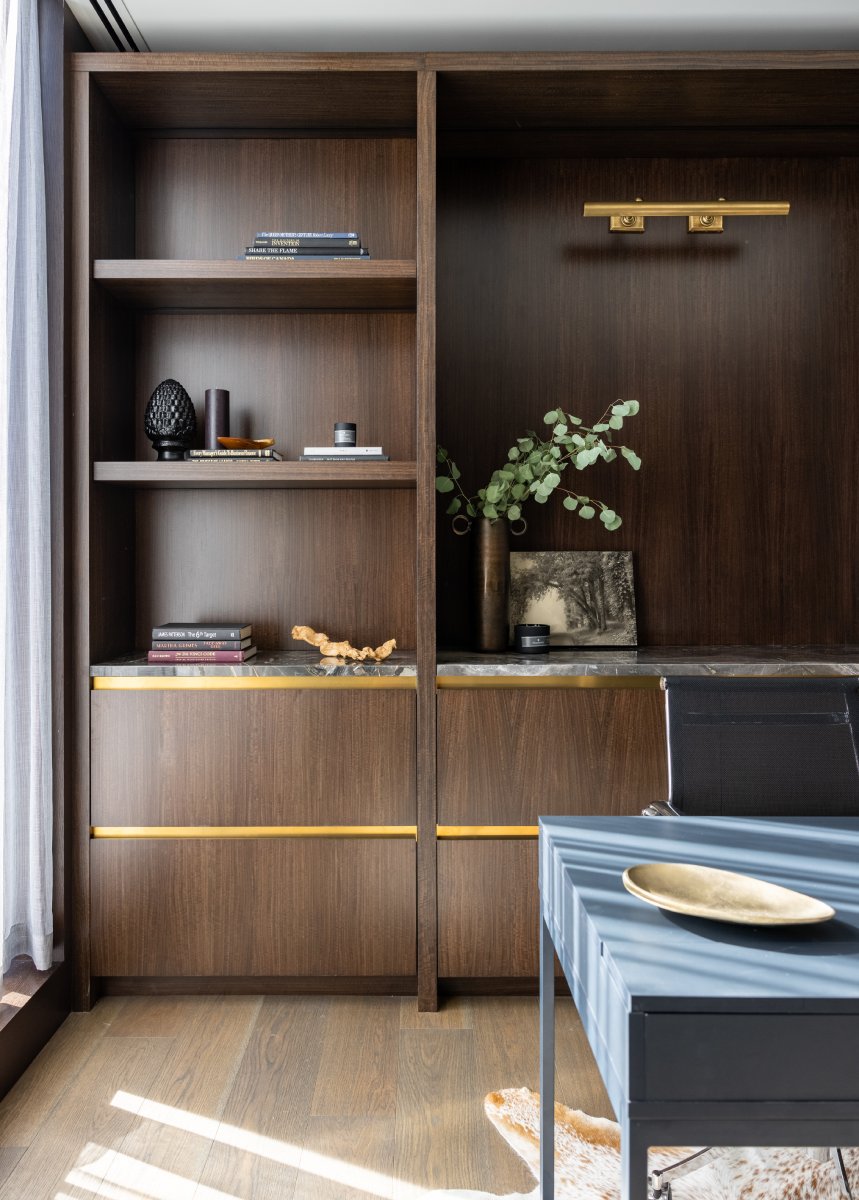 Home office with wood built-in bookcase.